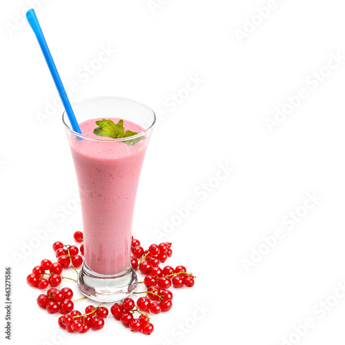 Red currant and glass with fruit smoothie isolated on white . free space for text.