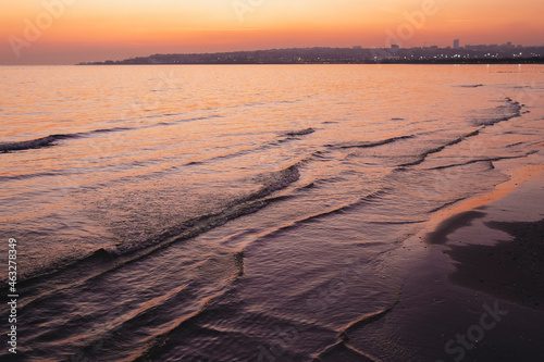 small waves at sunset