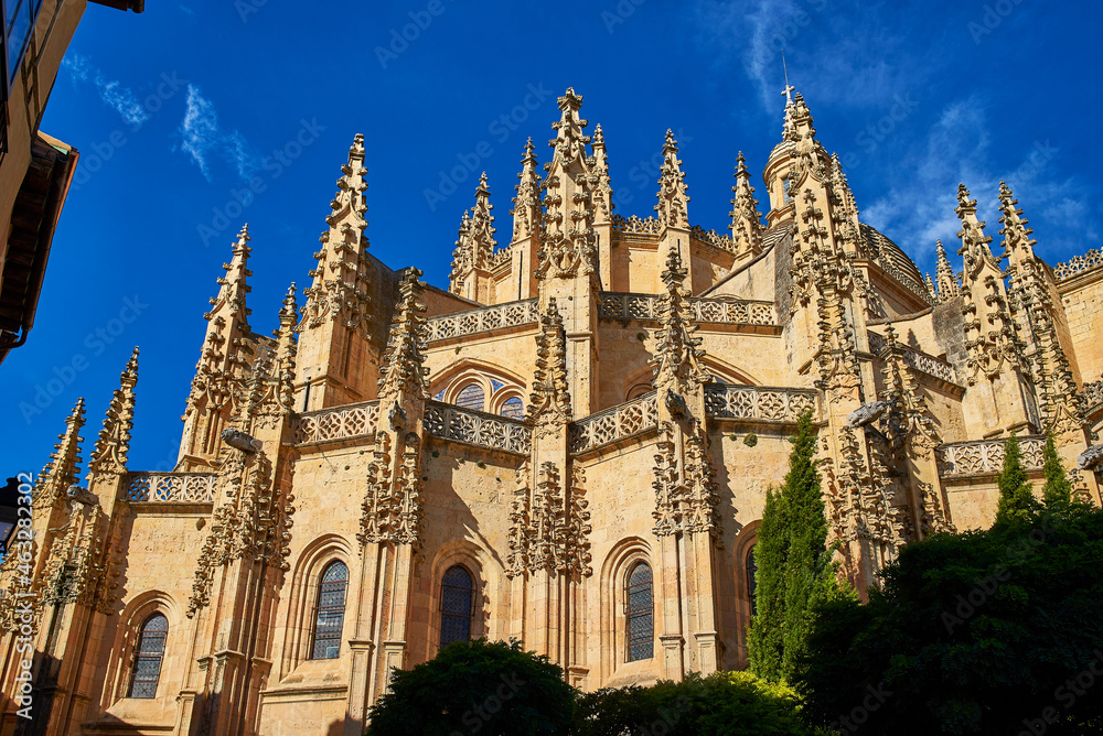 Fototapeta premium Apse topped by pinnacles, of the Segovia Cathedral, a catholic temple devoted to the Assumption of the Virgin Mary and San Frutos. View from Plaza Mayor square. Segovia, Spain.