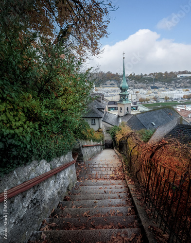 Imbergstiege Stairs and St Johns on Imberg Church during autumn - Salzburg, Austria photo