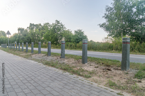 Bollards to prevent parking on the roadside.