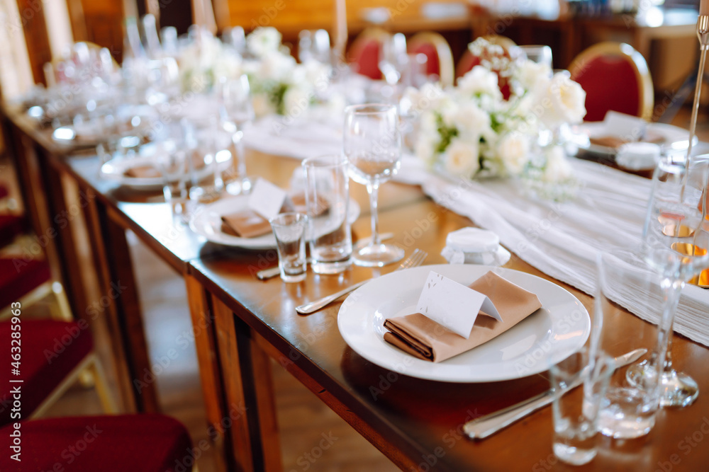 Festive table. Banquet table with wedding and festive serving. Wedding, birthday, party, event concept. Festive table. Banquet table with wedding and festive serving. Wedding, birthday, party, event concept.