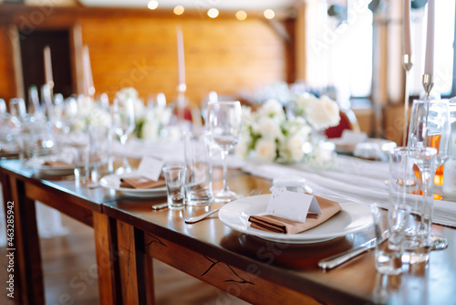 Festive table. Banquet table with wedding and festive serving. Wedding, birthday, party, event concept.