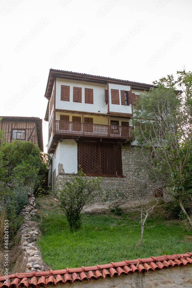 Traditional Ottoman house in Safranbolu. Safranbolu UNESCO World Heritage Site. Old wooden mansion turkish architecture. Ottoman architecture. Safranbolu house in green garden. Traditional Ottoman house in Safranbolu. Safranbolu UNESCO World Heritage Site. Old wooden mansion turkish architecture. Ottoman architecture. Safranbolu house in green garden.