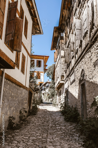 Fototapeta Naklejka Na Ścianę i Meble -  Turkey Safranbolu historic street and houses. Stone roads and wooden ottoman mansions. Safranbolu UNESCO World Heritage Site.