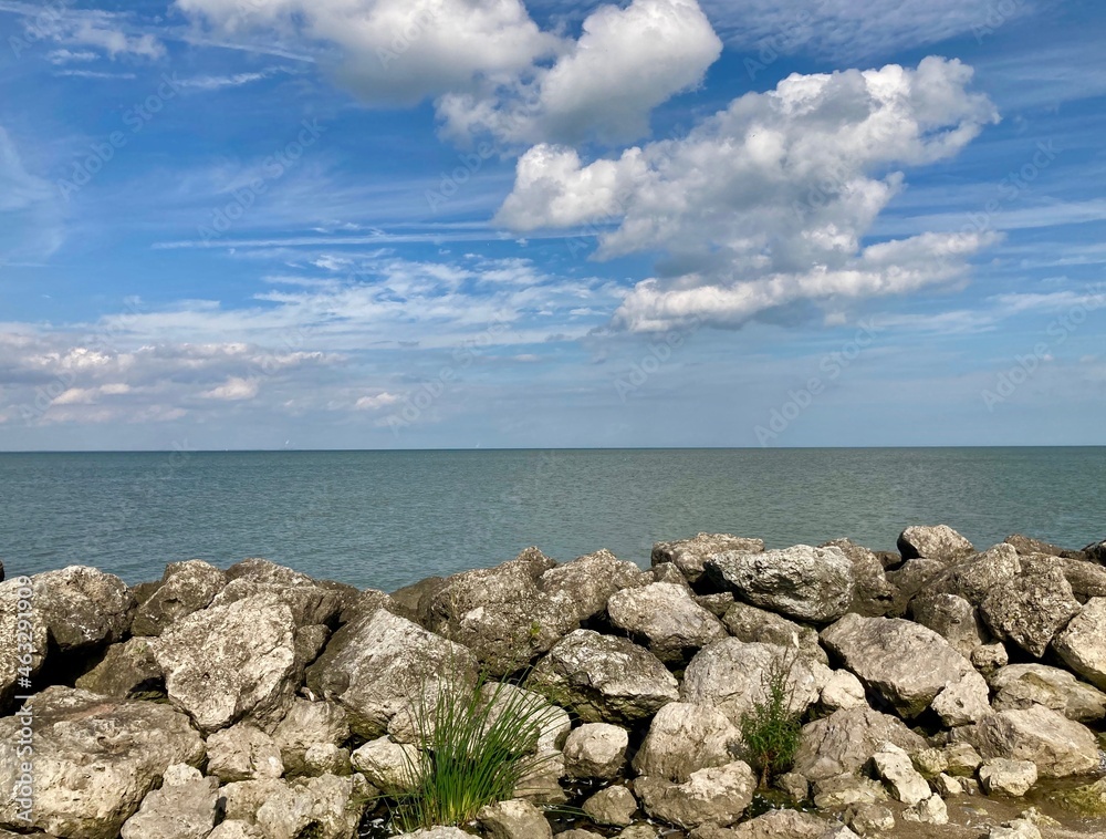 sea and rocks with cloudy sky sea and rocks with cloudy sky