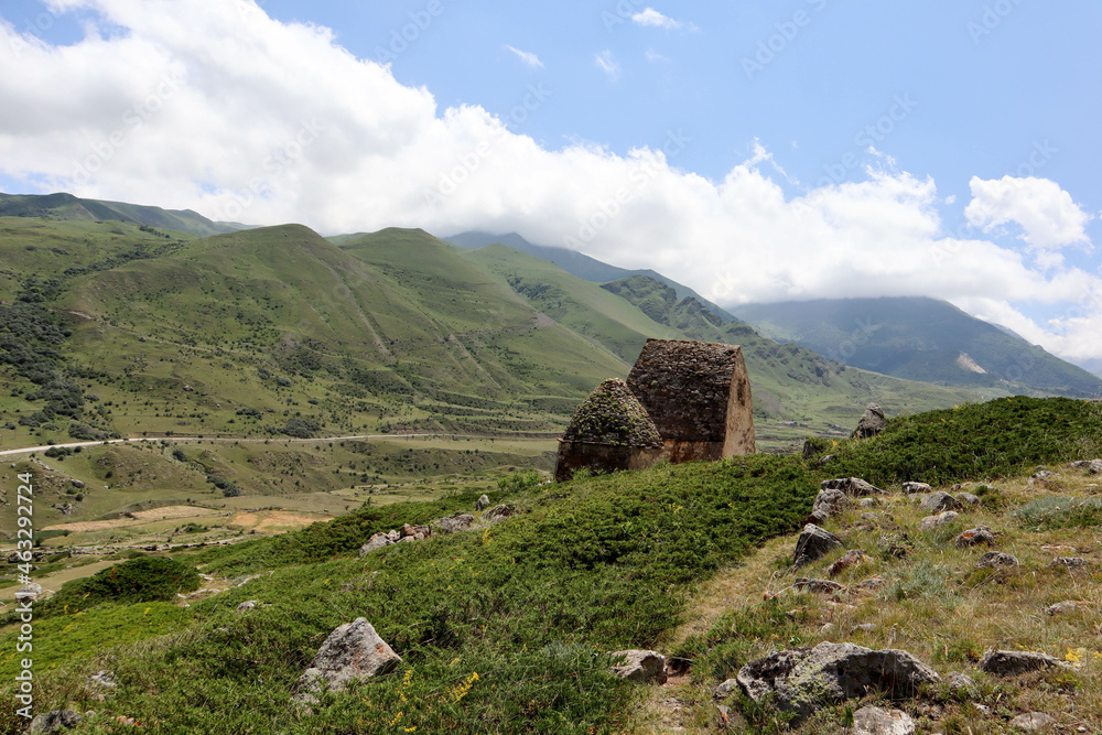 amazing picturesque mountain landscape in Chegem valley, Caucasus mountain, Russia with ancient stone tombs of 
