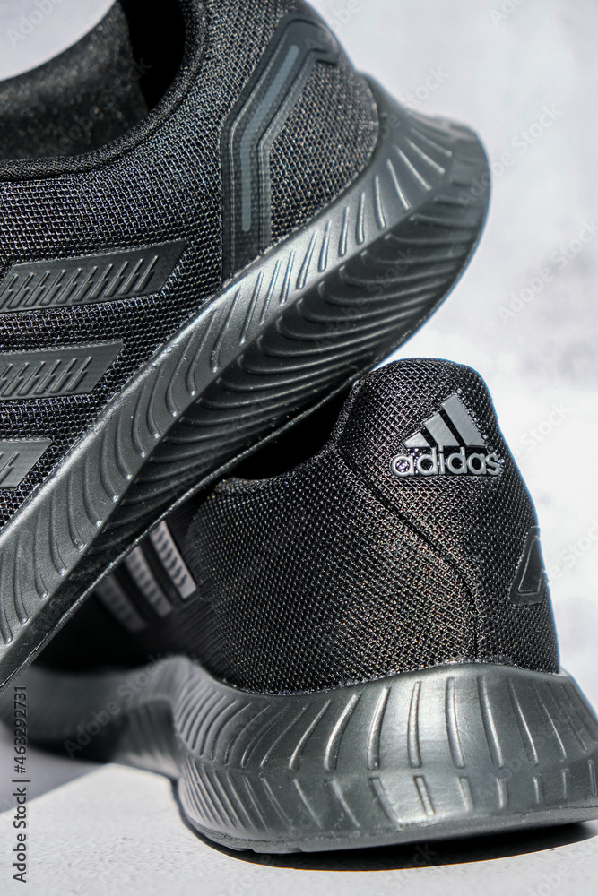 Kiev Ukraine - October 2021 Adidas swift run shoes for running for woman -  illustrative editorial Black Adidas Running boots. Multinational company.  Product shots. Stock Photo | Adobe Stock