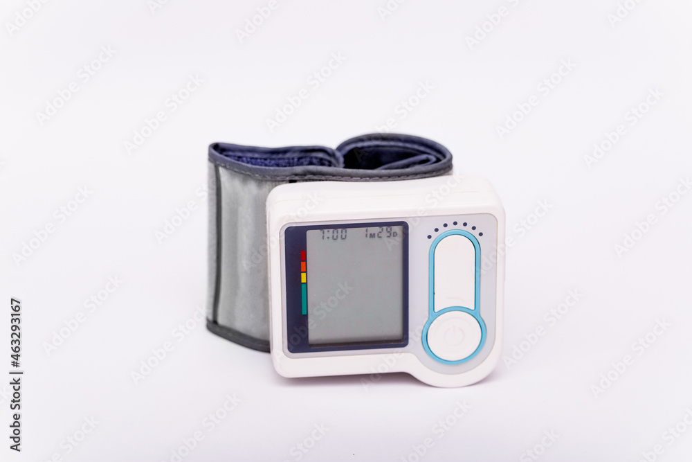 Tonometer device for diagnosis to measure of blood pressure and pulse, health and self-image of a monometer on a white background Tonometer device for diagnosis to measure of blood pressure and pulse, health and self-image of a monometer on a white background
