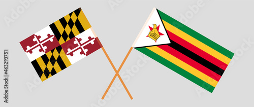 Crossed flags of the State of Maryland and the Republic of Zimbabwe. Official colors. Correct proportion photo