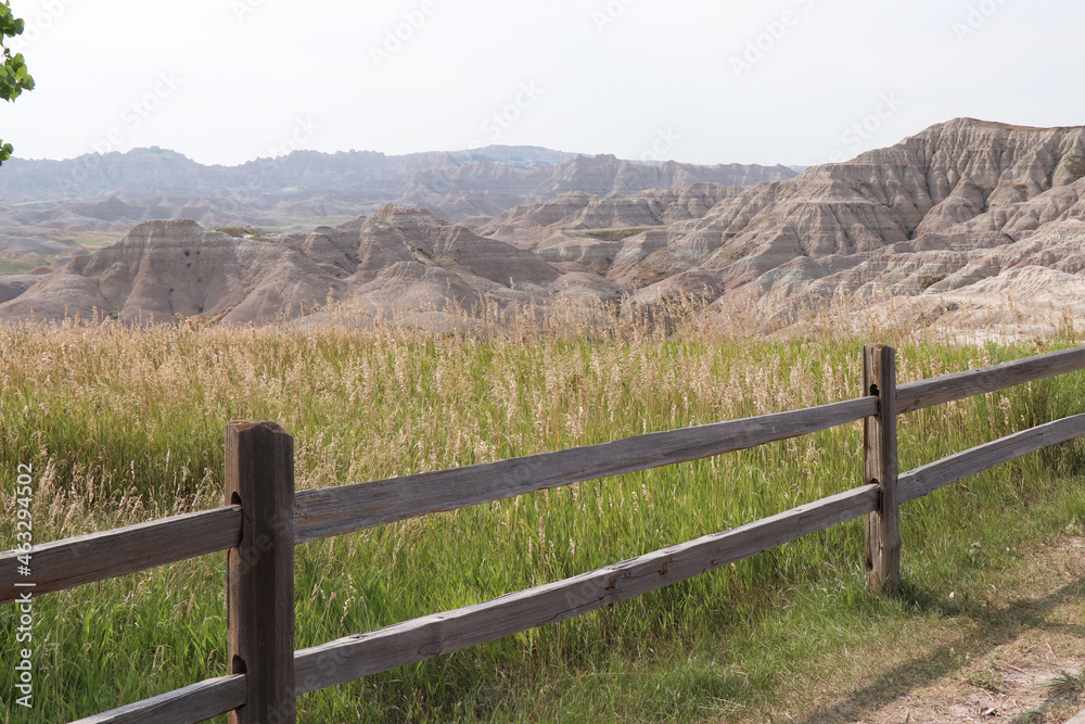 Badlands National Park Grasses and Hills Through Fence