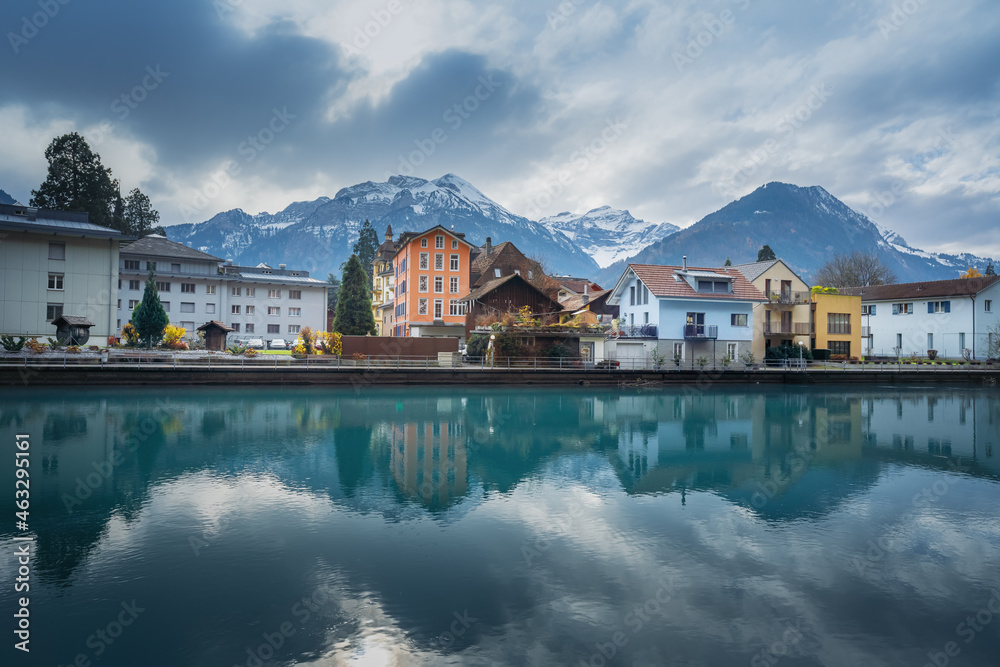 Naklejka premium Colorful buildings in Interlaken and Aare River - Interlaken, Switzerland