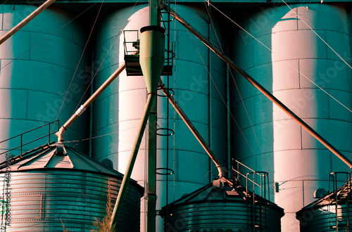 Close-up form a front view of a pair of silos of a flour factory a country town near Cordoba Argentina photo