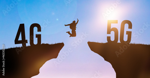 Technology change from 4G LTE to 5G, global wireless network. Silhouette man jumping from cliff to cliff on sky background. Modern networking concept photo photo