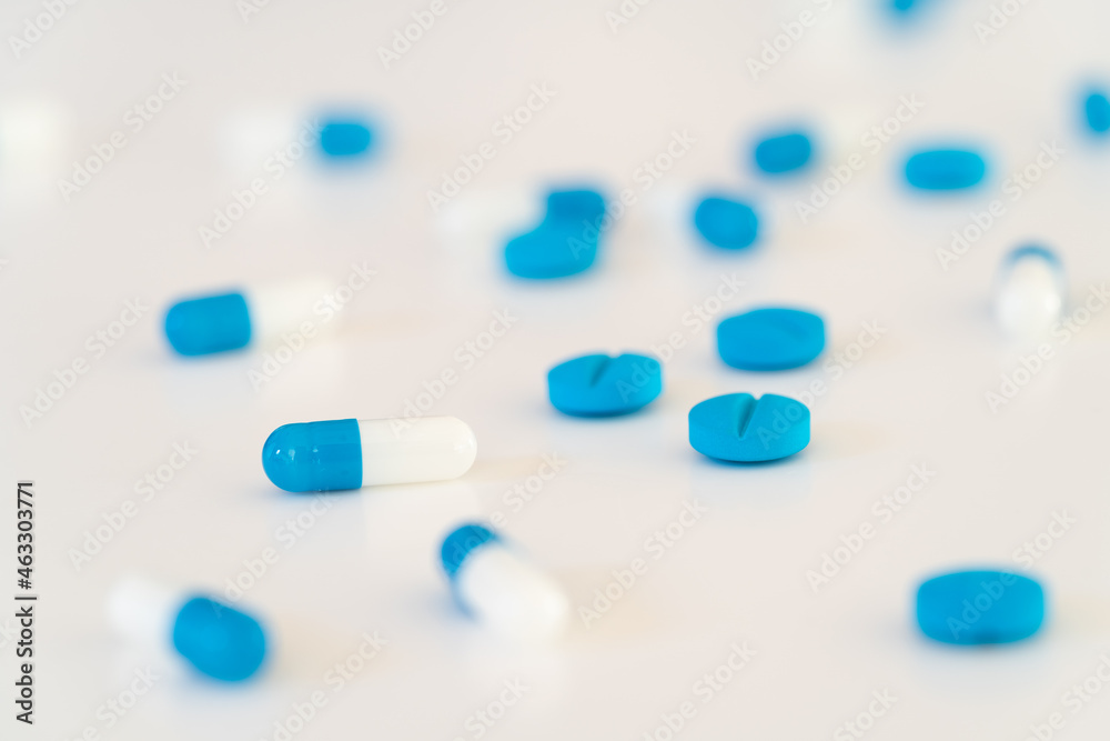 Assorted pharmaceutical medicine pills, tablets and capsules.Pills background. Assorted pharmaceutical medicine pills, tablets and capsules.Pills background.