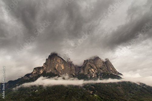 Dark Clouds over high mountains and mystic forrest