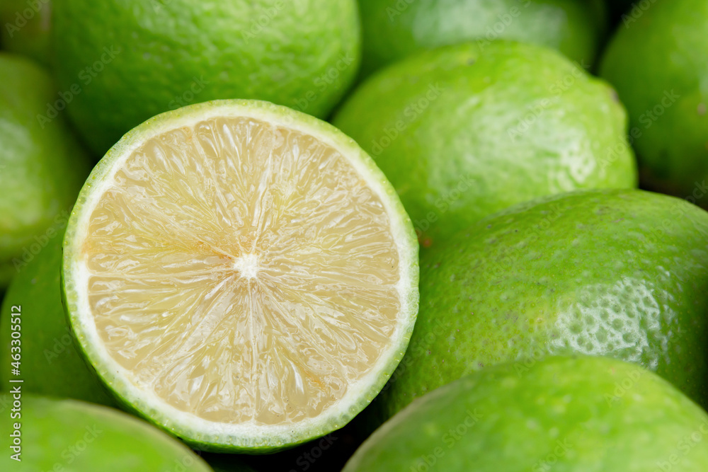 Lime slice citrus fruits background. Fresh juicy limes. Healthy food. Lime slice citrus fruits background. Fresh juicy limes. Healthy food.
