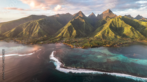 Paradise island sunset with mountains and coral reefs. French polynesia, Tahiti, Teahupoo