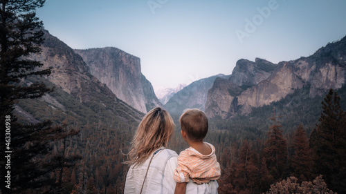 Mother and son at Yosemite National Park, Mountains and Valley view. California, USA