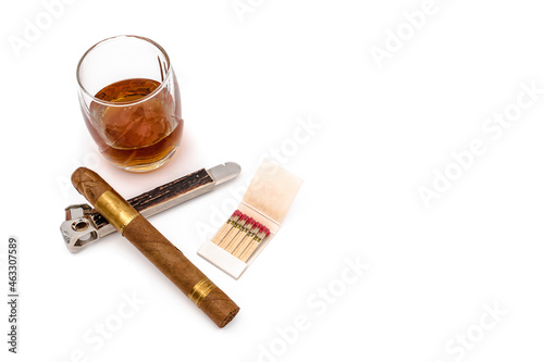 Quality cigars with cognac, cutter and matches
