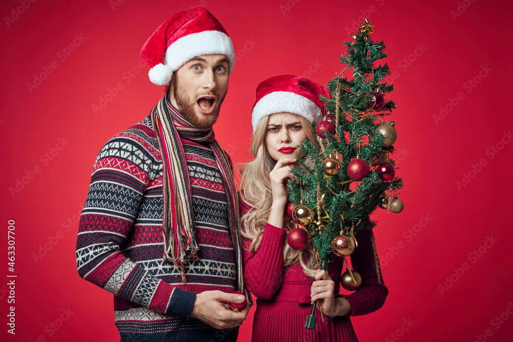 man and woman in new year clothes holiday decoration romance man and woman in new year clothes holiday decoration romance