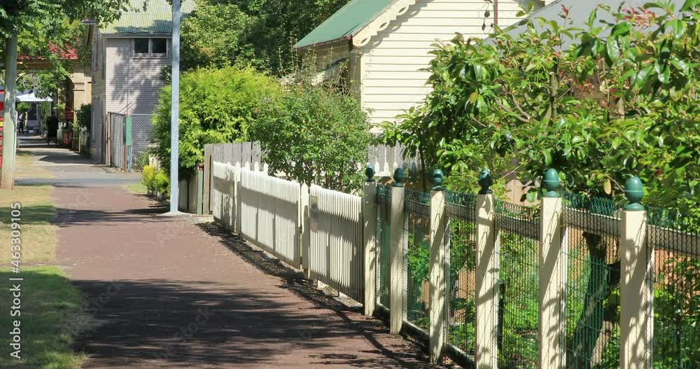 Left to right pan of footpath on main street of Ross which is a village in the Midlands of the state of Tasmania, The town is noted for its historic bridge, and convict history, Tasmania, Australia Left to right pan of footpath on main street of Ross which is a village in the Midlands of the state of Tasmania, The town is noted for its historic bridge, and convict history, Tasmania, Australia