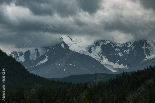 View beyond the snow-capped peaks of the mountains near Aktash in the Altai Republic