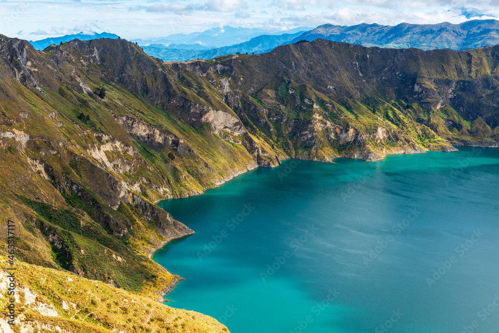 Quilotoa turquoise volcanic crater lagoon landscape at sunrise, Quilotoa Loop hike, Quito, Ecuador.