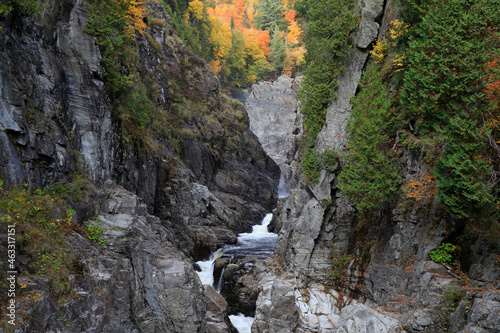Canyon Sainte-Anne waterfall in autumn, Quebec, Canada