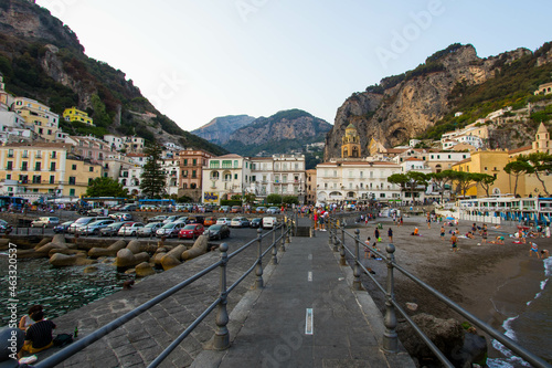 AMalfi, Italy : 03 april 2019 : Panoramic view of beautiful Amalfi on hills leading down to coast, Campania, Italy. Amalfi coast is most popular travel and holiday destination in Europe. © Martina