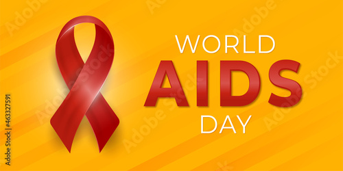 Realistic world aids day with ribbon on yellow background
