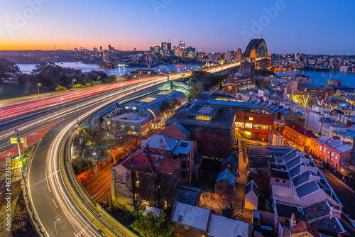 Panorama view of harbor bridge near opera house in twilight night sky background, Sydney city, Australia.