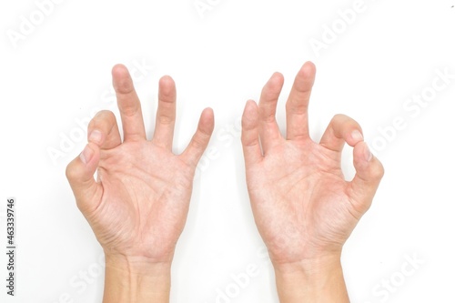 Hand and finger examination for muscle weakness.