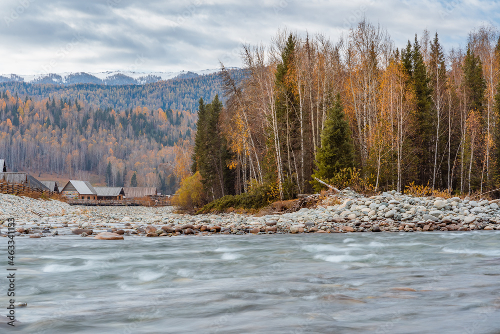 The autumn landscape of river and Hemu village, in Xinjiang province, China. The autumn landscape of river and Hemu village, in Xinjiang province, China.