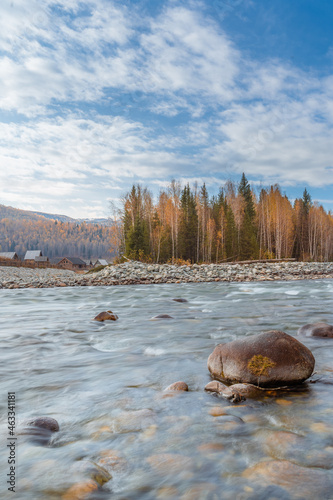 The autumn landscape of river and Hemu village, in Xinjiang province, China.