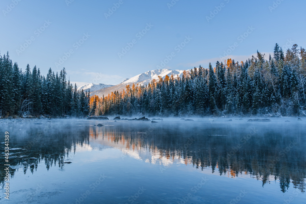 The winter landscape of Kanas lake in Xinjiang province, China, at sunrise. - obrazy, fototapety, plakaty 
