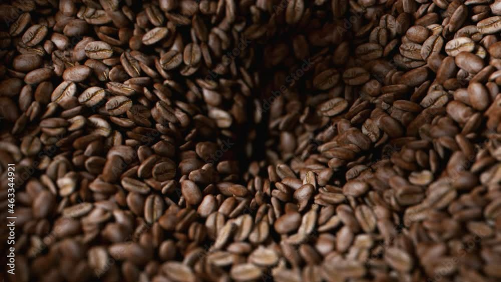 Coffee beans roasted in grinder falling into the interior of the machine
Coffee beans roasted in grinder falling into the interior of the machine