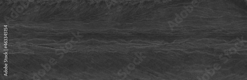 Abstract dark grey black slate background or texture.