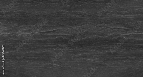 Abstract dark grey black slate background or texture.