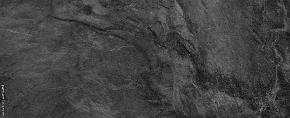 Gray grunge banner. Abstract stone background. The texture of the stone wall. Close-up.