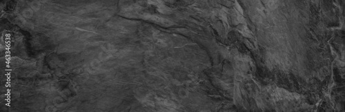 Gray grunge banner. Abstract stone background. The texture of the stone wall. Close-up.