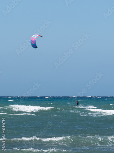 Kitesurfing During a Windy Day with a Very Rough Sea