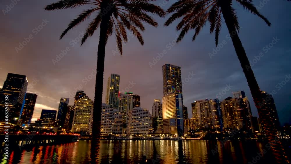 Time lapse of Miami skyline at night moving from right to left 