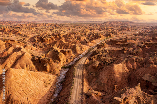 Картината върху платно long road in sandstone mountains in Xinjiang, China
