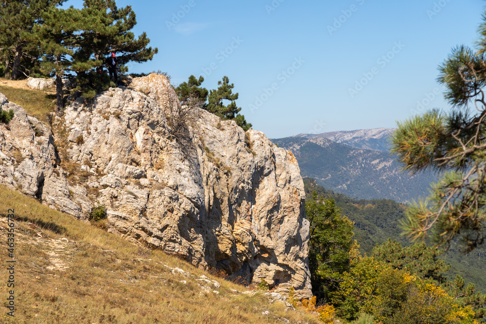 Crimea rocky mountain with trees and high mountains and hills in the background