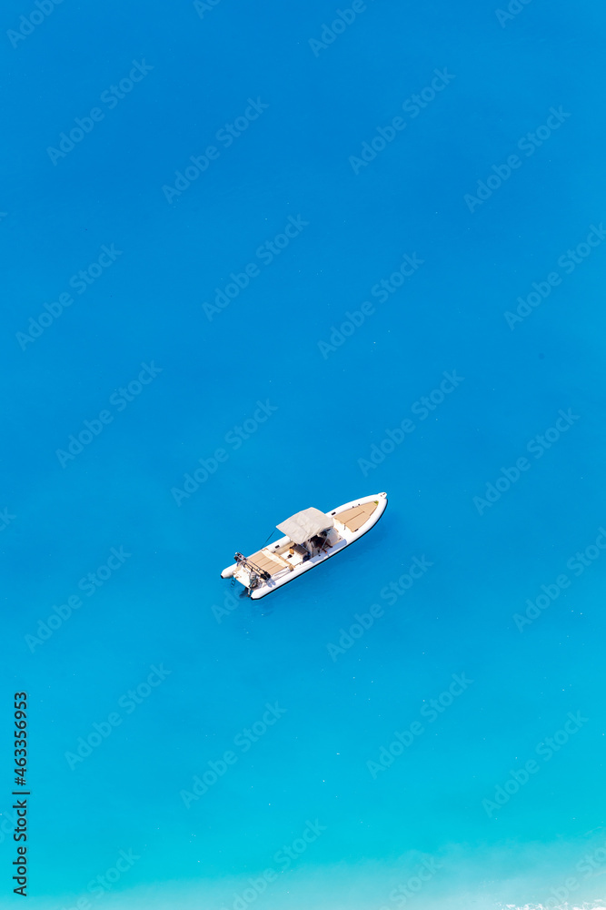 Aerial drone view of moored boat near the coast of Zakynthos, Greece Aerial drone view of moored boat near the coast of Zakynthos, Greece