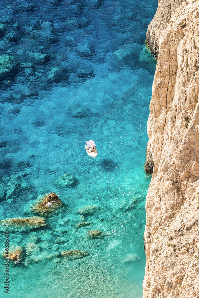 Aerial drone view of moored boat near the coast of Zakynthos, Greece