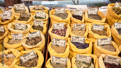 Spice counter at a market in Cannes, France photo