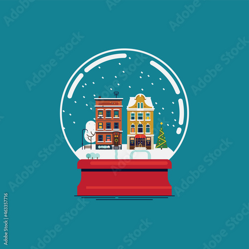 Flat design souvenir snow globe with little town in winter. Christmas gift vector design element
