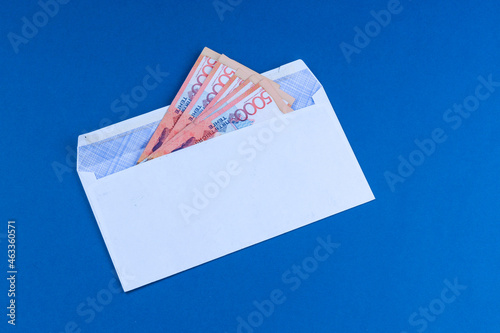 A bribe in the form of money with a face value of 5,000 tenge. Or a salary. Volute: Kazakhstani tenge.